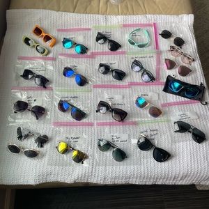 Lot of 23 sunglasses / men & women